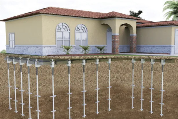 Cutaway illustration of helical piers driven deep into the soil beneath a Florida home